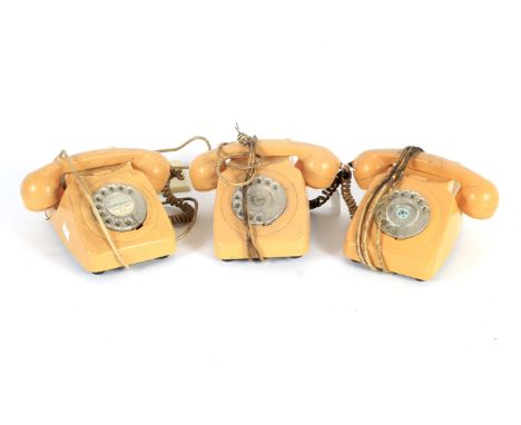 Three vintage cream coloured rotary dial telephones. Including a 746F
