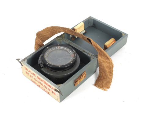 A military AFT compass TYPE P8, No 87031 H. In a wooden case. L18cm x D18cm x H11cm