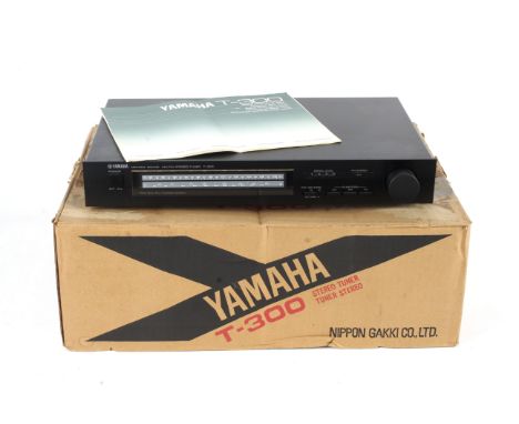 A Yamaha Stereo hi-fi separate tuner T-300. NS Series, s/n 102412, with FM &amp; AM antenna, owner's manual in original box. 