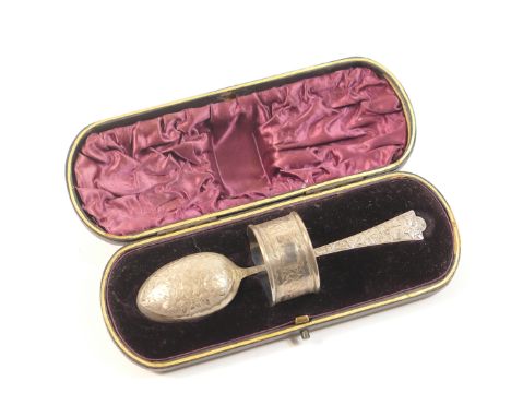 Late Victorian silver christening set, Birmingham 1891, comprising spoon and napkin ring, all engraved with ivy leaves, prese