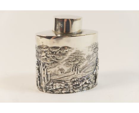 Late Victorian silver tea caddy, by Nathan &amp; Hayes, Chester 1899, oval form repousse decorated with cherubs hunting wild 