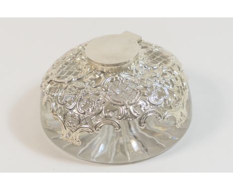 Late Victorian silver mounted heavy glass inkwell, by William Comyns, London 1899, hinged cover and pierced repousse work at 