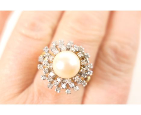 Pearl and diamond cluster ring, the central pearl of approx. 9mm diameter, bordered with 44 small round brilliant cut diamond