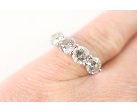 Diamond four stone ring, having four well matched round brilliant cut diamonds totalling approx. 2.5cts, well matched in colo