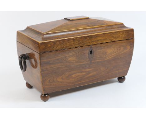 Regency rosewood sarcophagus tea caddy, with boxwood edging, hinged domed cover opening to reveal two wooden caddies and with