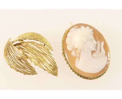 9ct gold brooch, formed as three overlapping leaves, 40mm, weight approx. 5.8g; also an 18ct gold mounted oval portrait cameo
