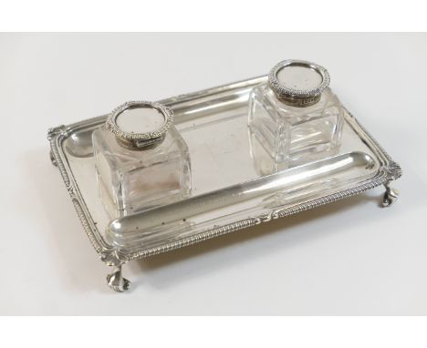 George V silver inkstand, by Harris &amp; Sons, London 1913, rectangular form with gadrooned supporting two cut glass inkwell