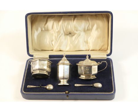 George V silver condiment set, by Mappin &amp; Webb, Birmingham 1931, comprising pepper pot, wet mustard pot and salt cellar,