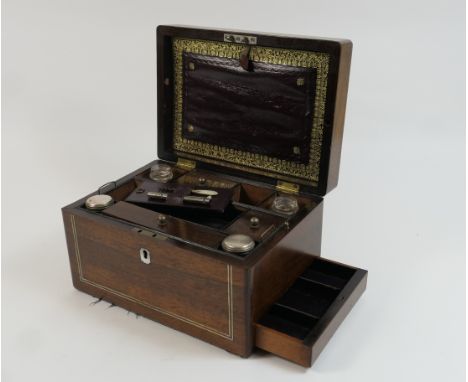 Victorian rosewood and mother of pearl inlaid vanity box, circa 1850, having a fitted interior with compartments, bottles and