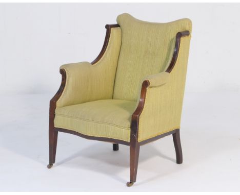 Late Victorian mahogany and upholstered armchair, upholstered throughout in light green corded fabric, raised on tapered squa