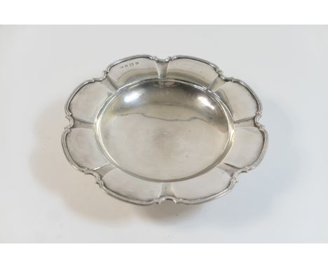 George VI silver dish, by Mappin &amp; Webb, Birmingham 1937, petalled circular form raised on a short circular foot, 22.5cm 