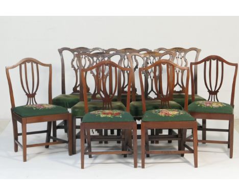 Five Chippendale style mahogany dining chairs, late 19th Century, each with interlaced splat back and green fabric upholstere