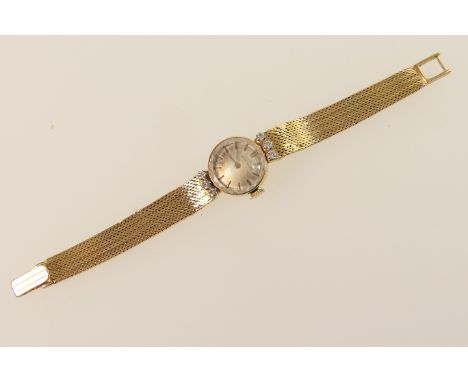 Zenith lady's 18ct gold and diamond bracelet wristwatch, signed 16mm silvered dial with baton numerals, 17 jewel manual wind 