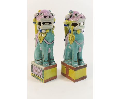 Pair of Chinese porcelain Dogs of Fo joss stick holders, decorated in bright colours, height 23cm 