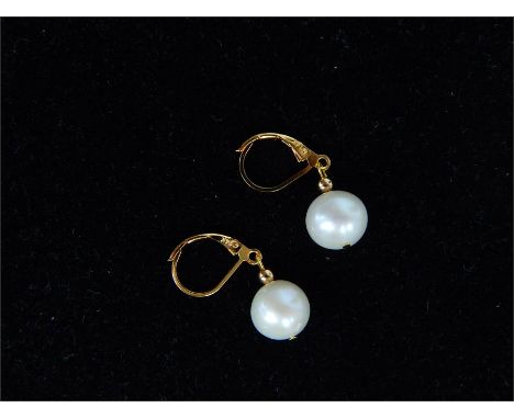An elegant, boxed pair of 14 ct yellow gold and South Sea white pearl drop earrings, each earring suspended by a round, cream