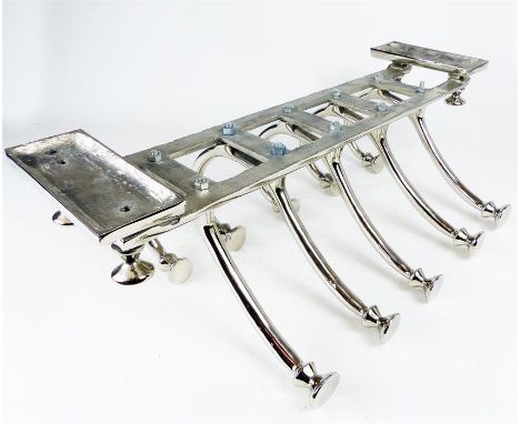 A chrome coat rack 