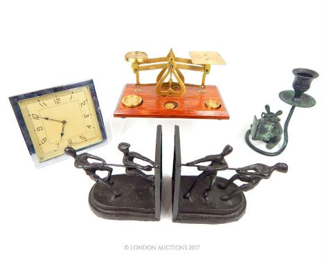 A lot of decorative items to include a chromed Art Deco clock with a square face, a pair of bronzed bookends with figures pul
