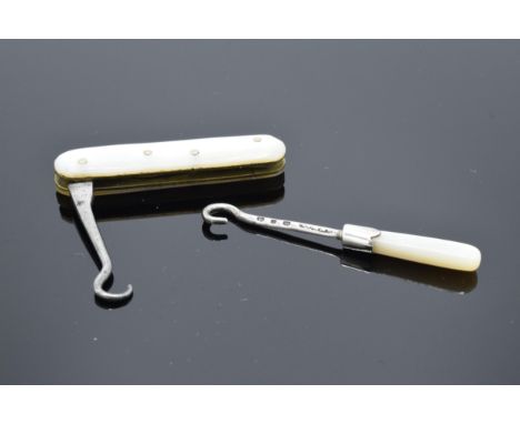 A pair of small items to include a Mother of Pearl and silver button hook and a Mother of Pearl pocket knife and button hook 