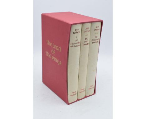 A cased set of J R R Tolkien Lord of the Rings books to include The Return of the King, The Two Towers and The Fellowship of 