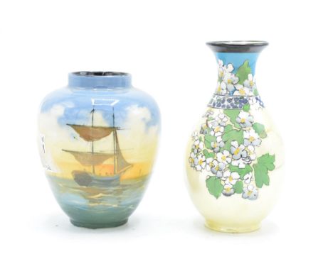 Royal Doulton series ware vases, one with a floral scene, the other one with tall ships (2). In good condition with no obviou