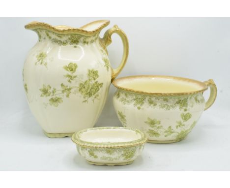 A collection of Powell, Bishop and Stonier (P B S) pottery to include a jug, a guzzunder and a similar item (3) with green fl