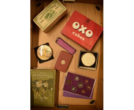 A mixed collection of items to include a vintage Oxo tin, coin set, Stratton compacts, 'Two Scapegraces' hardback book etc. 