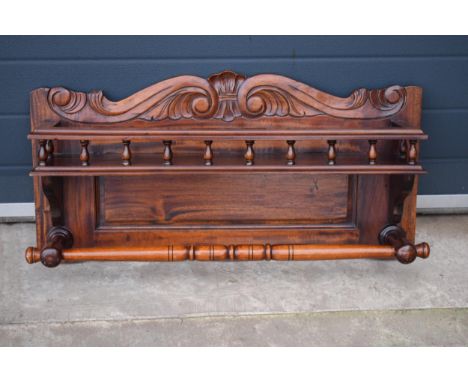 An early 20th century wooden shelving unit / spice shelf with carved decoration and turned features. 80 x 39cm. 