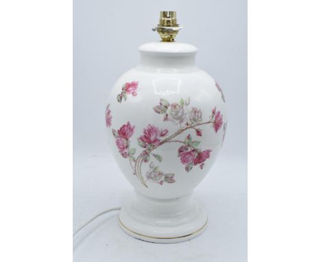 Aynsley large floral lamp base decorated with pink roses 33cm tall. In good condition with no damage. Light fitting will need