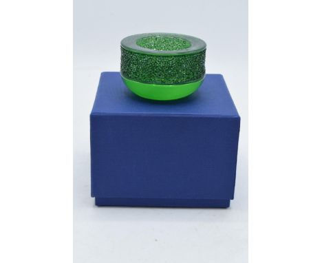 Boxed Swarovski glass tea light holder. In good condition with no obvious damage or restoration. 