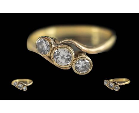 Ladies Pleasing 1920's 18ct Gold 3 Stone Diamond Set Ring. Marked 18ct and Platinum to Interior of Shank. The 3 Pave Set Diam