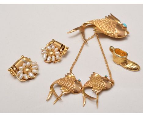 Yellow metal turquoise set fish brooch, with two matching clips, a pair of yellow metal and pearl ear clips and a boot-shaped