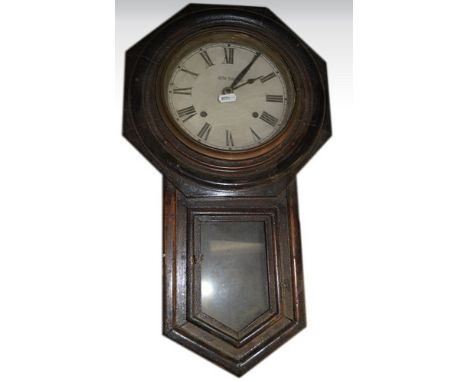 An American wall clock, signed Seth Thomas, an oak mantel clock, an oak mantel clock case, and an alarm clock (4).