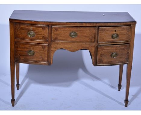 Edwardian mahogany and beechwood bow-front dressing table, fitted with five drawers around the kneehole, square tapering legs