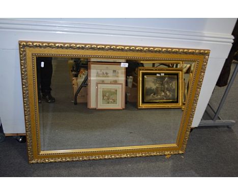 Contemporary gilt finish wall mirror, rectangular beveled plate, 75 x 106cms.