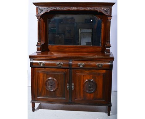 Victorian walnut sideboard, canopy back with a beveled mirror, the base with two drawers over two panelled doors, width 138cm
