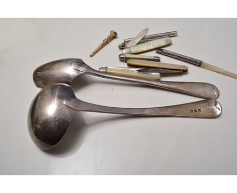 George III silver ladle, probably London 1815, modern silver cheese scoop, silver bladed folding pen knives, etc.