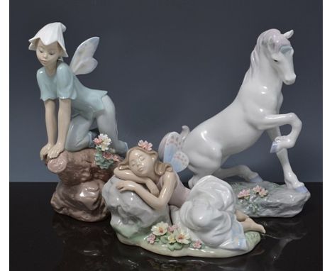 Lladro model of a unicorn, 23cms, a Lladro model of a sleeping fairy and a Lladro model of a pixie, each boxed, (3).
