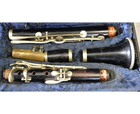 Ebonised clarinet, marked Aiglon, cased.