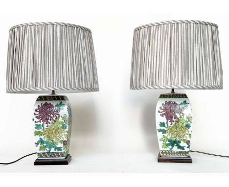 TABLE LAMPS, a pair, mid 20th century Chinese ceramic curved facetted polychrome chrysanthemum decorated and carved wooden ba