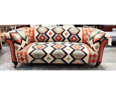 KILIM SOFA, George Smith style, studded anatolian kilim upholstered with turned front supports and castors, 193cm W. 