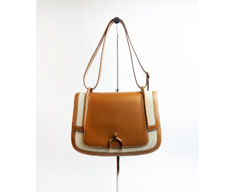 HERMÈS BARENIA TOILE, gold tone hardware, shoulder adjustable strap, flap closure with horse bit shape hardware, color matchi