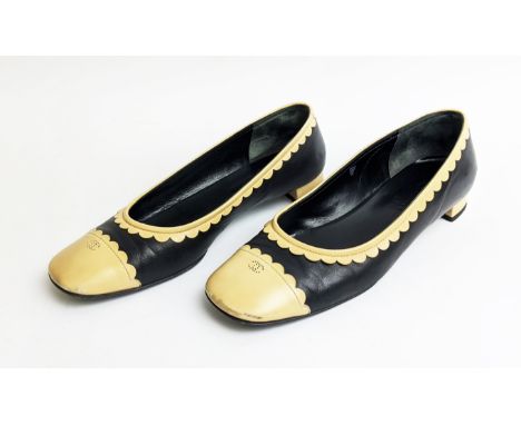 CHANEL VINTAGE FLAT SHOES, black leather with contrasting toes in cream leather and scallop details, iconic CC logo at the fr