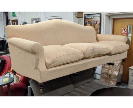 SOFA, large three seater, Victorian style, hump back, camel beige fabric upholstery, turned feet, castors, 90cm H x 238cm x 9