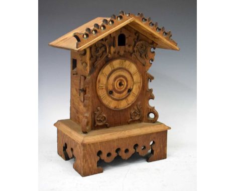 Stripped oak cuckoo clock, 30cm high