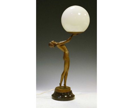 Art Deco-style bronzed spelter lamp of a figure of a lady supporting opaque glass globe, raised on serpentine base, 50cm high