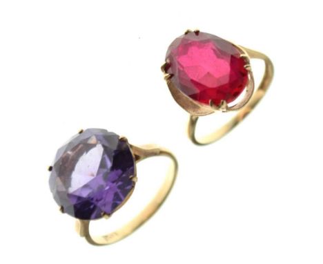 9ct gold ring set synthetic oval cut ruby, size L, and another ring set purple synthetic round cut stone, stamped '9ct', size