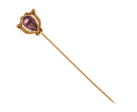 Art Nouveau stickpin, stamped 'H14K', set with a purple paste, possibly American, 1.5g gross approx, cased