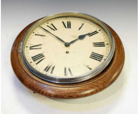Oak framed wall clock, early 20th Century, timepiece movement stamped 'Garrard', 39cm diameter
