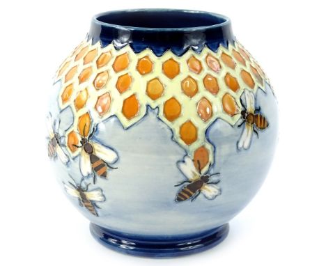 A Moorcroft Honeycomb pattern vase, designed by Philip Richardson, with tube lining by Lillian Leese (Johnson), the paintress