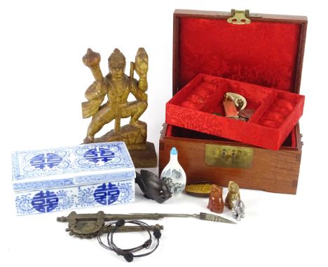 A collection of oriental items, to include a Chinese rectangular blue and white box and cover, snuff bottles, a brass cutter,